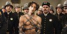 Adrien-Brody-as-Harry-Houdini-in-chains-about-to-do-his-disappearing-act-in-History-Channel-TV...jpg